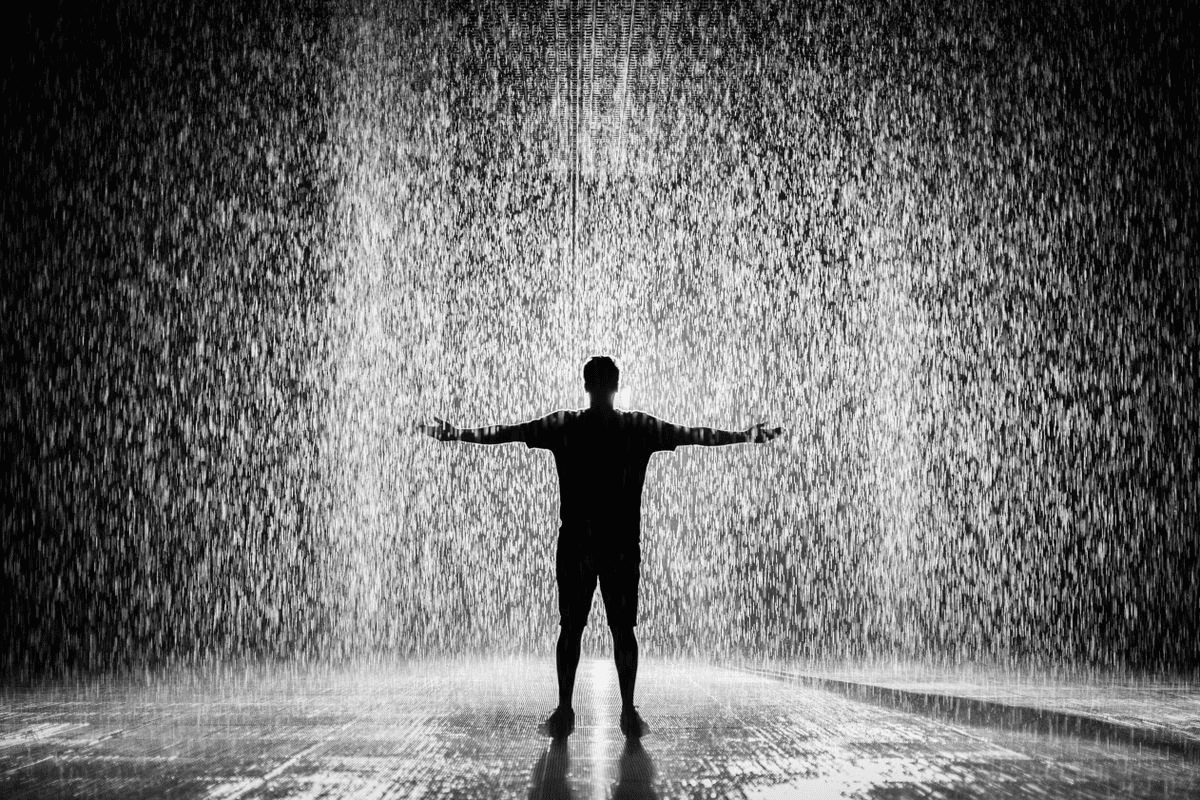 A finely detailed Qwen Image 3 composition featuring a human figure set against a backdrop of rain-like particles.